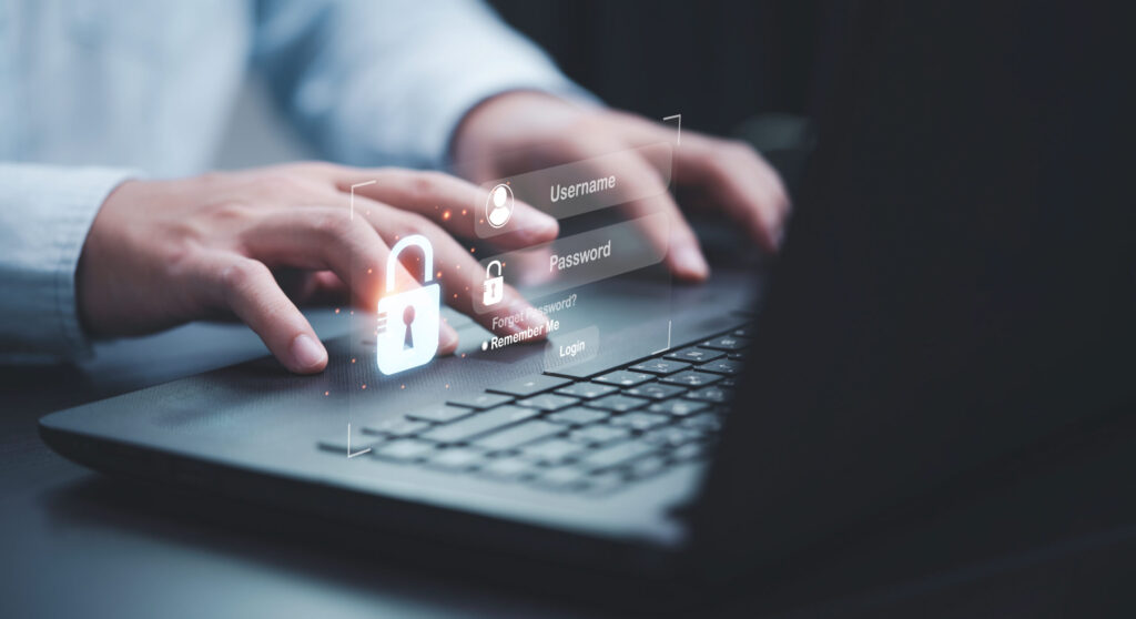 Businessman Typing On Keyboard Laptop Computer To Input Username