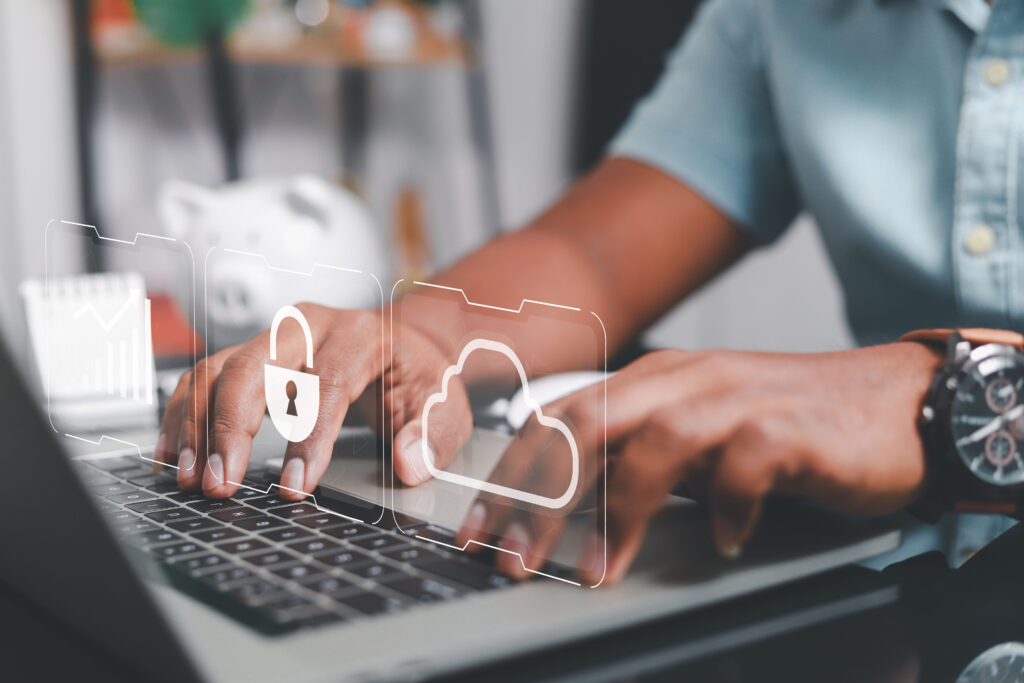person-typing-with-lock-and-cloud-icons-above