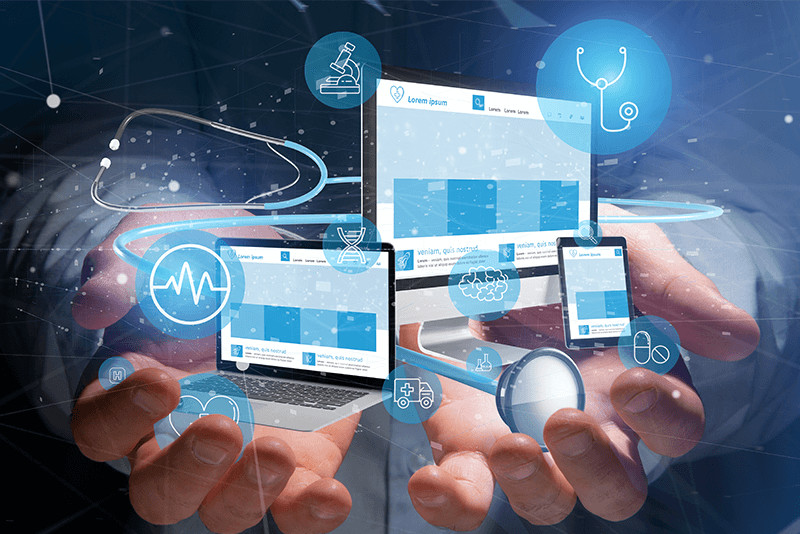 person holding healthcare computers surrounded by medical symbols