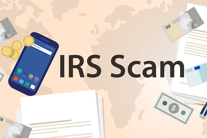 IRS scam wording surrounded by a phone, documents, and money