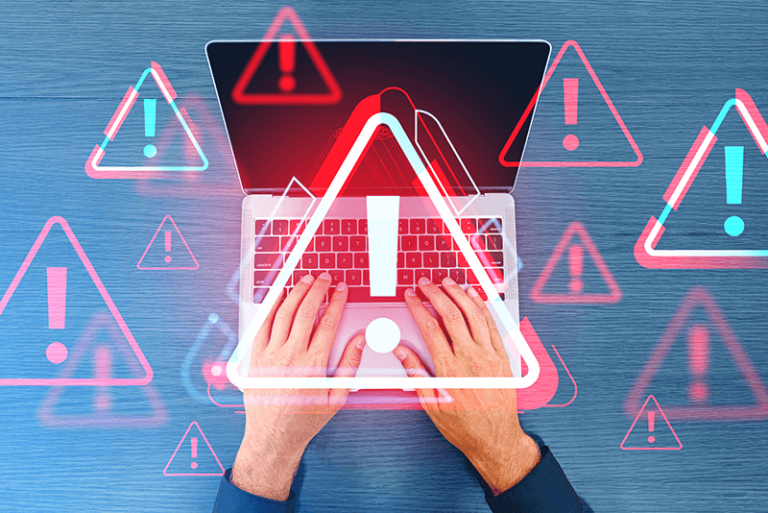 person using laptop with red and blue warning signs hovering over it