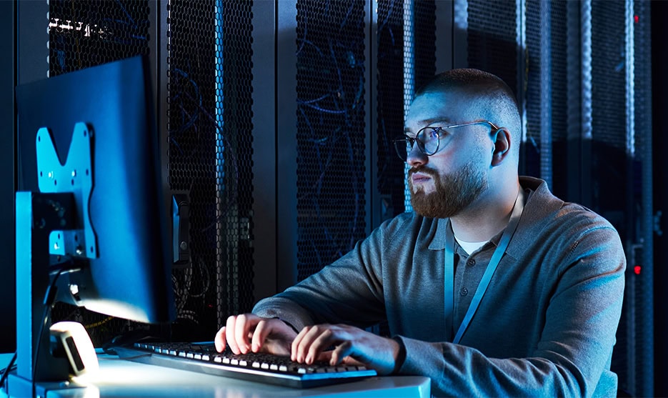 Data Center Technician Working Servers