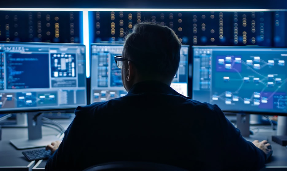 Cybersecurity Analyst Monitoring Data Center